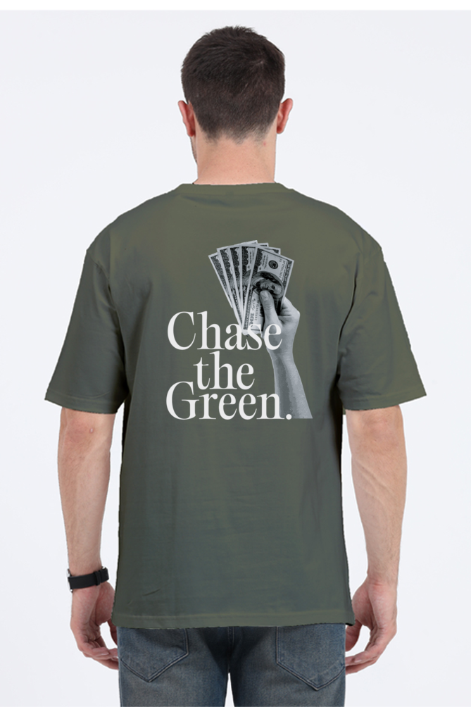 Model wearing olive green oversized men’s t-shirt – back view of “Chase the Green” graphic streetwear tee