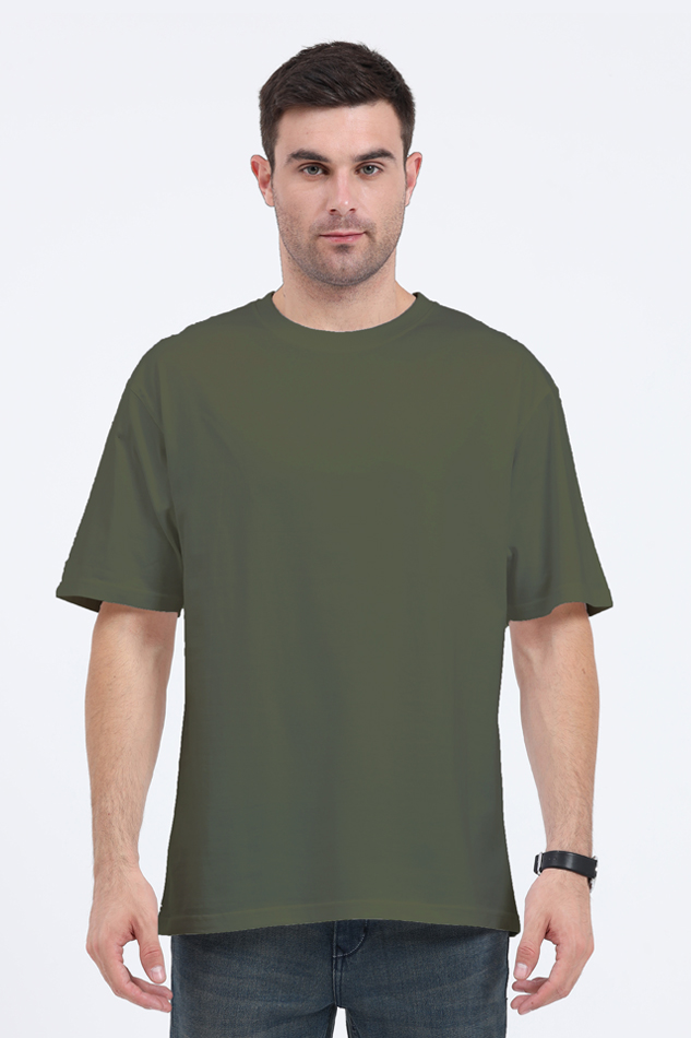Model wearing olive green oversized men’s t-shirt – “Chase the Green” cotton streetwear tee front view