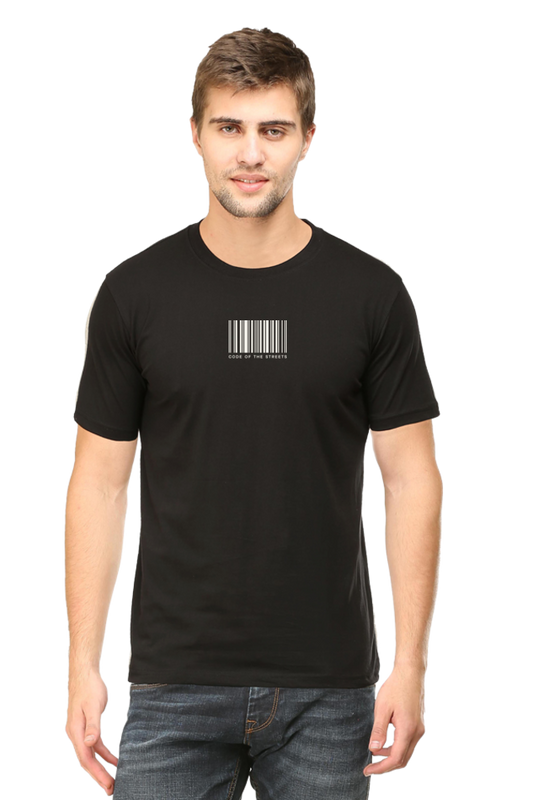 Model wearing black Code of the Streets men’s regular fit t-shirt front view – bold urban street-style graphic on soft cotton fabric