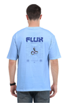 Model wearing blue oversized men’s t-shirt – back view of Flux graphic streetwear tee