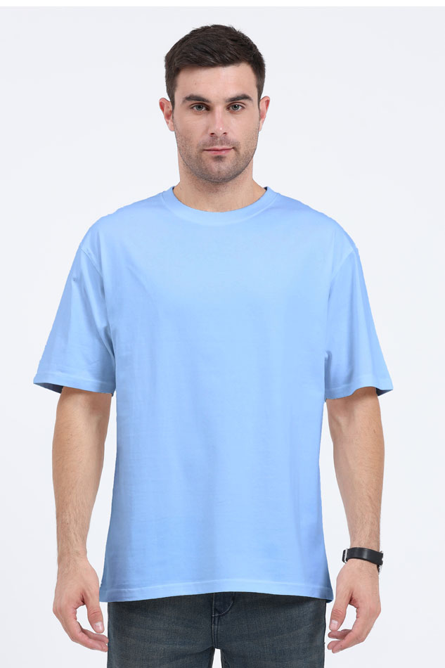 Model wearing blue oversized men’s t-shirt – Flux graphic cotton streetwear tee front view